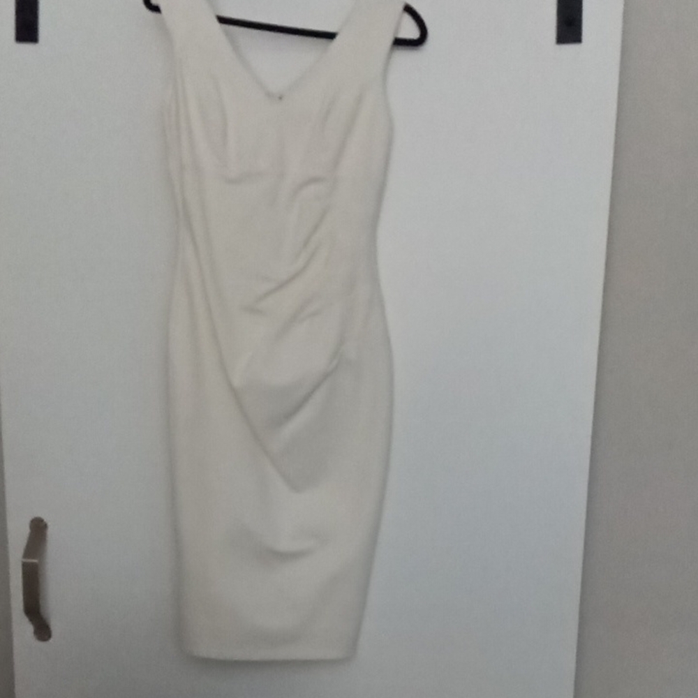 Elegant White Sleeveless Fitted Midi Dress
